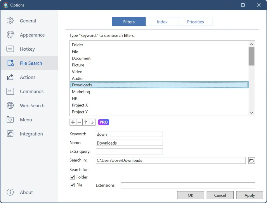 A screenshot of the Listary Options configuration window with the Filters menu selected on the left sidebar. The main panel shows a list of search categories with Downloads highlighted. Below, configuration fields are filled with the keyword down, name Downloads, and the specific folder directory path. Checkboxes for Folder and File are enabled, demonstrating how to set up custom search indexes.