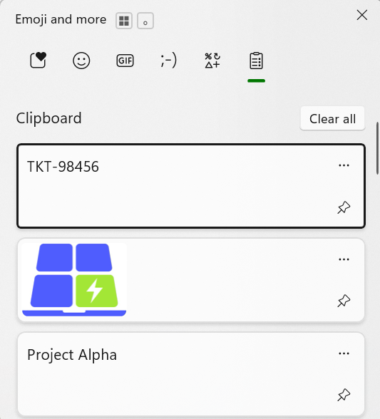 A close-up screenshot of the Windows Clipboard history interface in light mode, labeled Emoji and more. The menu displays stored clipboard items, including a text string for a ticket ID TKT-98456, a copied graphic image of the TurboTasking laptop logo, and a text snippet reading Project Alpha, each with option dots and a pin icon.